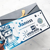 Ticket for Legoland Windsor Resort with a LEGO character design, held by a hand.