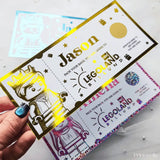 Colorful ticket with 'Jason' and 'Legoland' text, held by a hand.