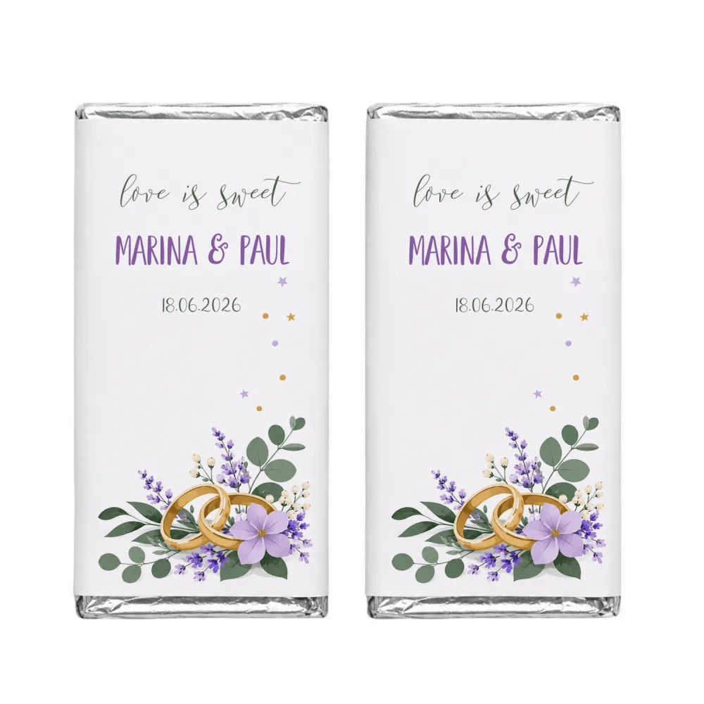 Two personalised 40g chocolate bars wrapped in silver foil with lilac rings wedding label and gold floral design