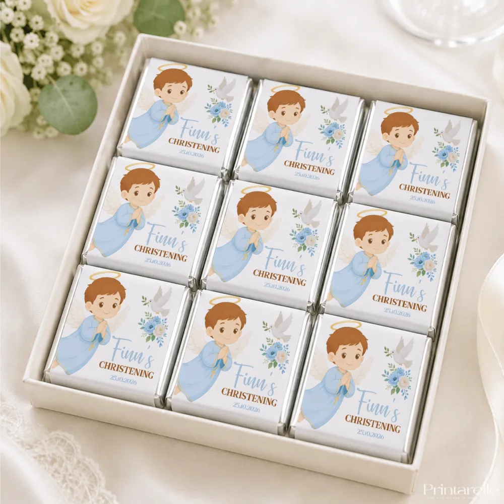 Nine individually wrapped christening mini neapolitans featuring cartoon angels on white foil packaging