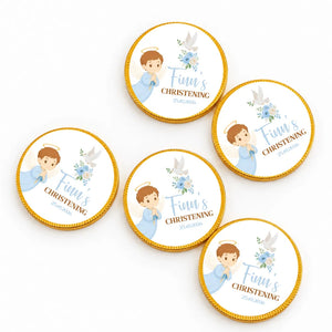 Circular chocolate coins with gold foil edges featuring a cartoon angel boy and personalized christening text and floral design