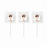 Three white lollipop favours with 8cm sticker featuring finn’s confirmation day illustration in clear plastic wrap