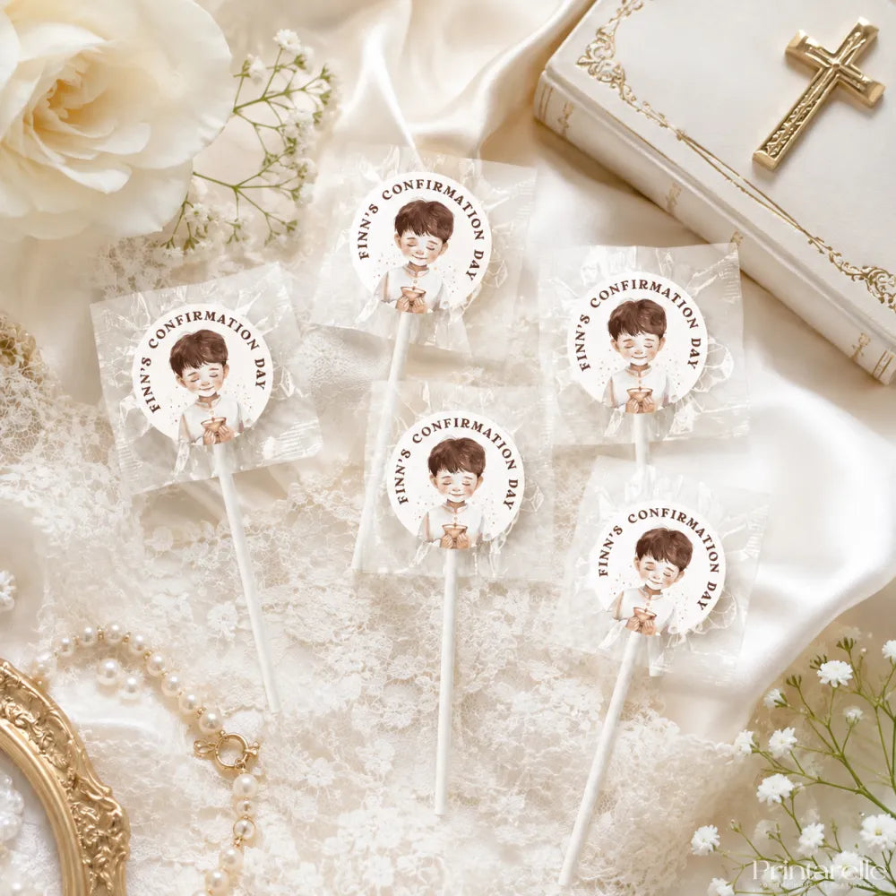 White lollipop favours with 8cm sticker showing cartoon boy in white for finn’s confirmation day assorted fruit flavors