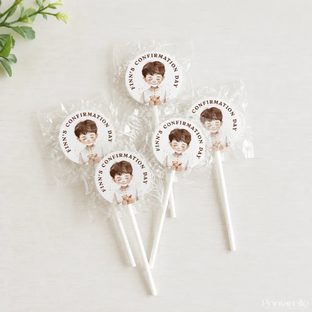 White lollipop favours with 8cm sticker featuring cartoon boy and gluten free text for finn’s confirmation day