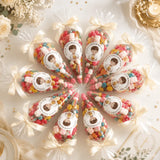 Clear plastic sweet cones tied with cream ribbons filled with colorful gummies and personalized confirmation labels