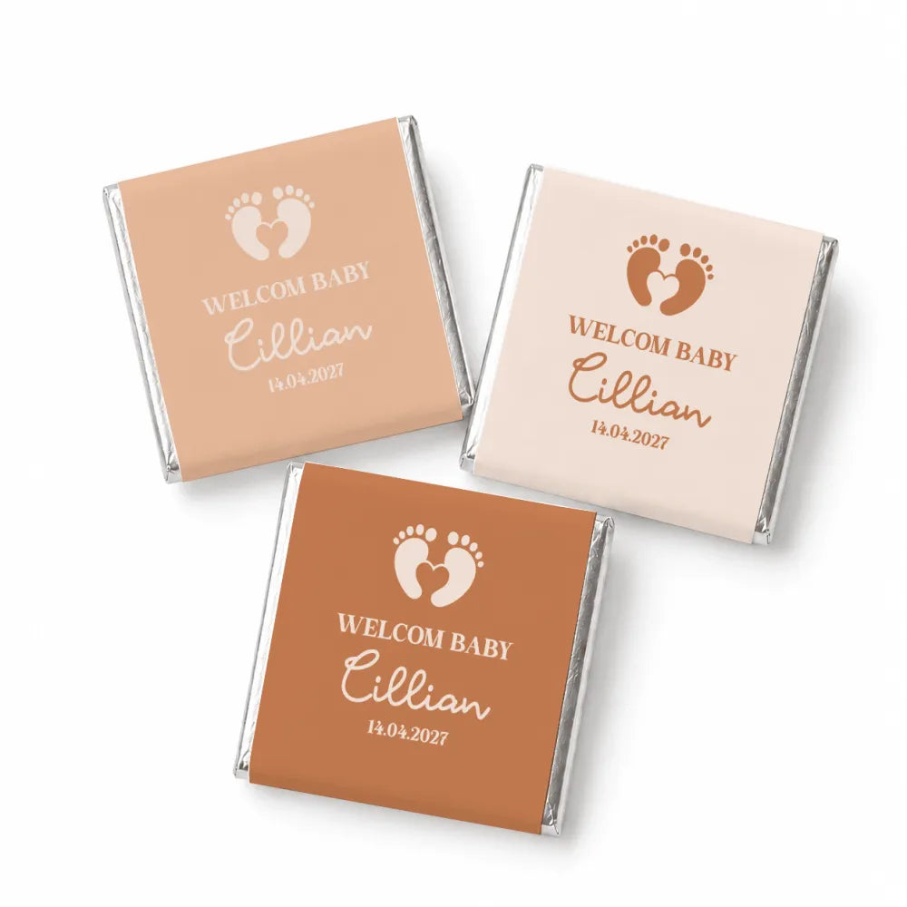 Personalized welcome baby mini neapolitan chocolates in peach cream and terracotta wrappers with silver foil edges