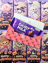 Pink halloween chocolate wrap with black bats and snap button holding purple cadbury dairy milk bar for little ghouls