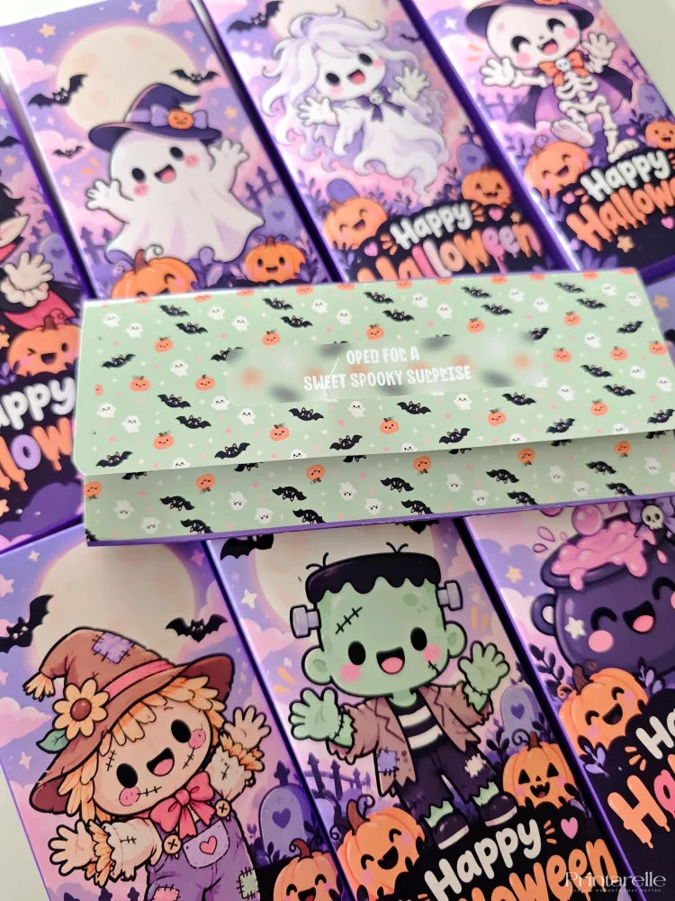 Light green rectangular halloween chocolate wrap with black bats orange pumpkins and open for a sweet spooky surprise text