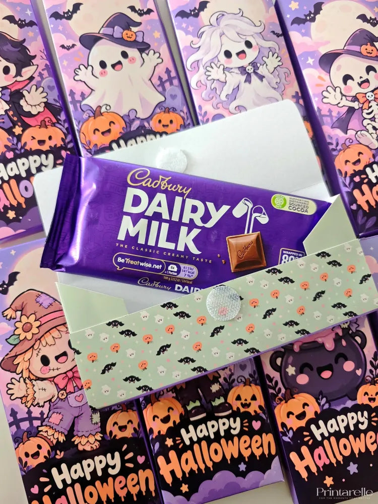 Purple cadbury dairy milk chocolate bar with glossy wrap and cartoon halloween chocolate wrap little ghouls design
