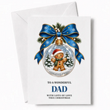 A dad christmas card featuring a glass bauble with a gingerbread dad in a santa hat and snowy pine trees inside