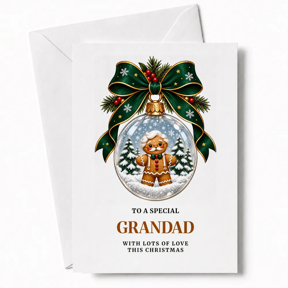 A festive grandad christmas card featuring a gingerbread grandad with round glasses and bow tie in a snow globe ornament