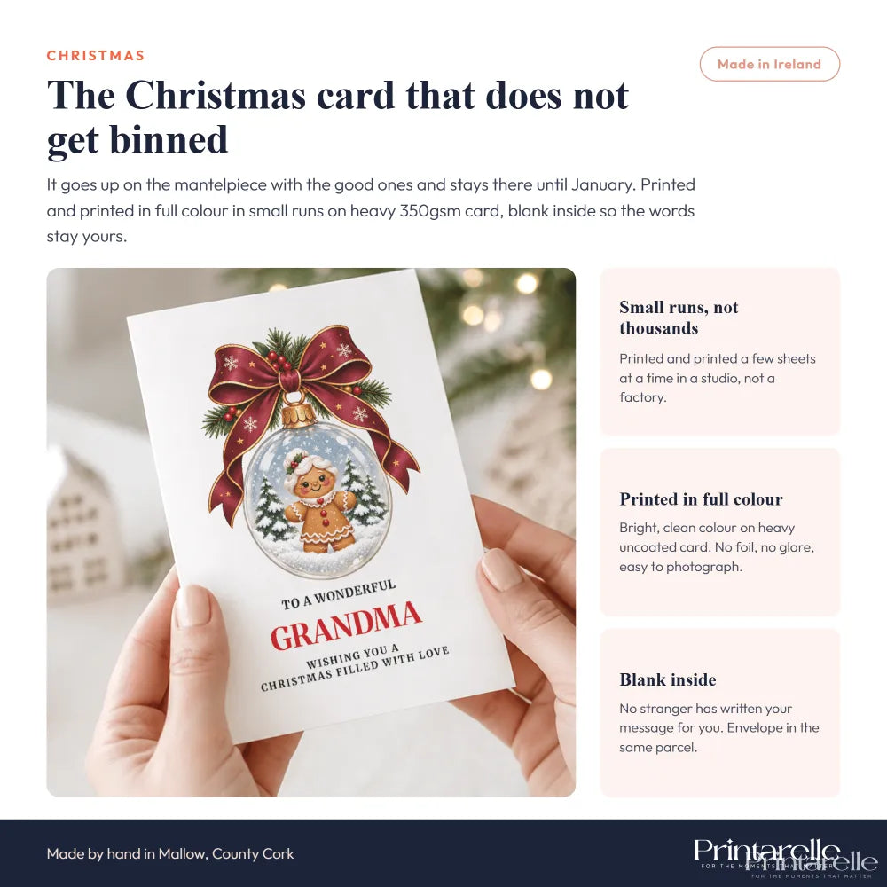 A grandma christmas card featuring a gingerbread grandma inside a snow globe with pine branches on white cardstock
