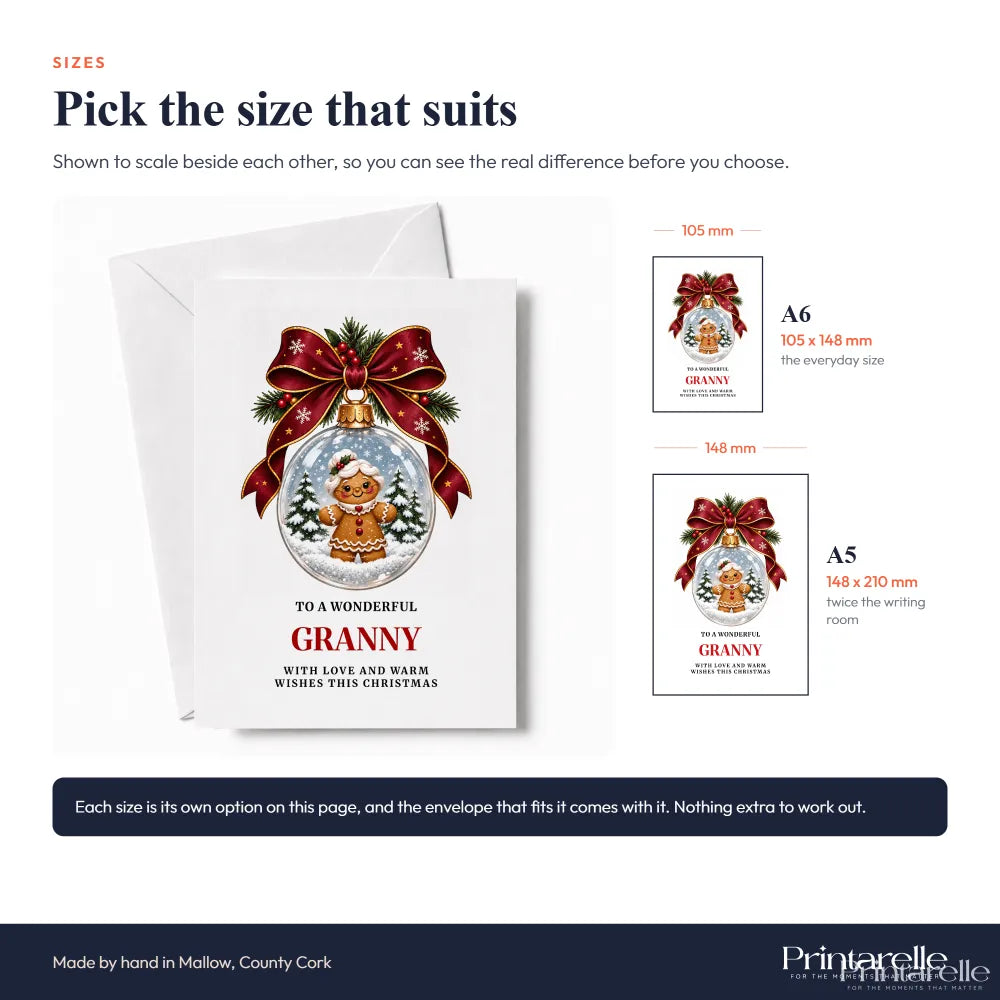 White granny christmas card with a gingerbread granny inside a glass bauble decorated with red ribbon and pine sprigs