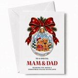 A festive white dad christmas card featuring a glossy red ribbon bow and gingerbread couple in a snow globe ornament
