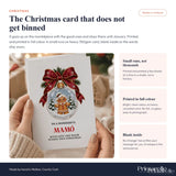 White mamó christmas card featuring a gingerbread man snow globe with red ribbon on heavy 350gsm paper