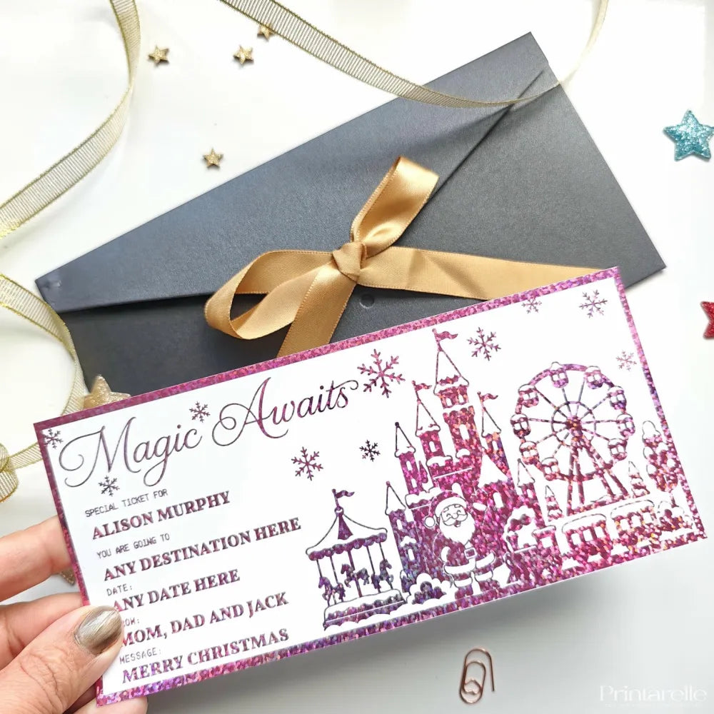 Pink glittery magic awaits reveal card with theme park castles santa claus and snowflakes for christmas surprise