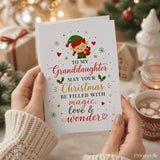 White christmas card with a green elf and festive design saying to my granddaughter may your christmas be filled with magic love wonder