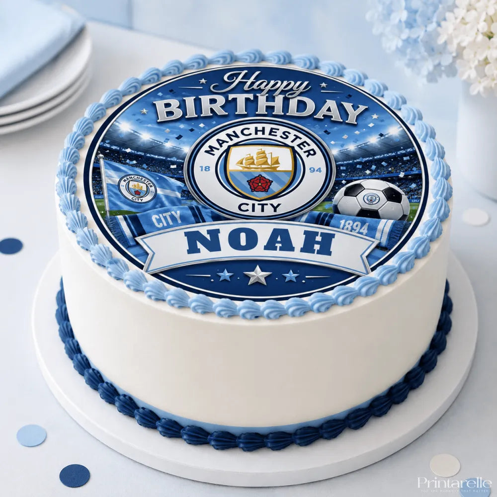 A round birthday cake with white frosting and a manchester city icing sheet cake topper with blue piping