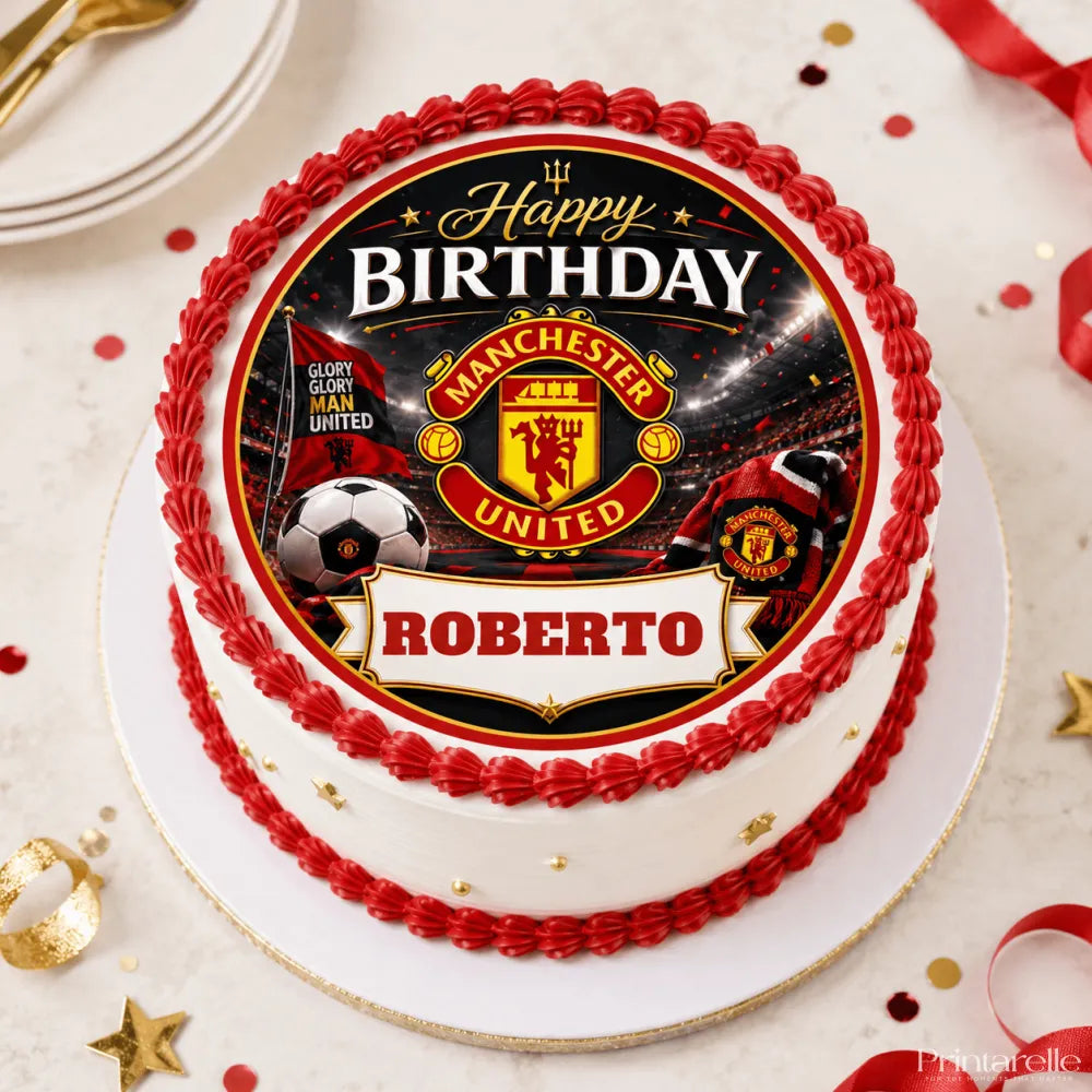 A round white birthday cake with a red frosting border and a manchester united edible icing sheet cake topper featuring the team logo and soccer ball