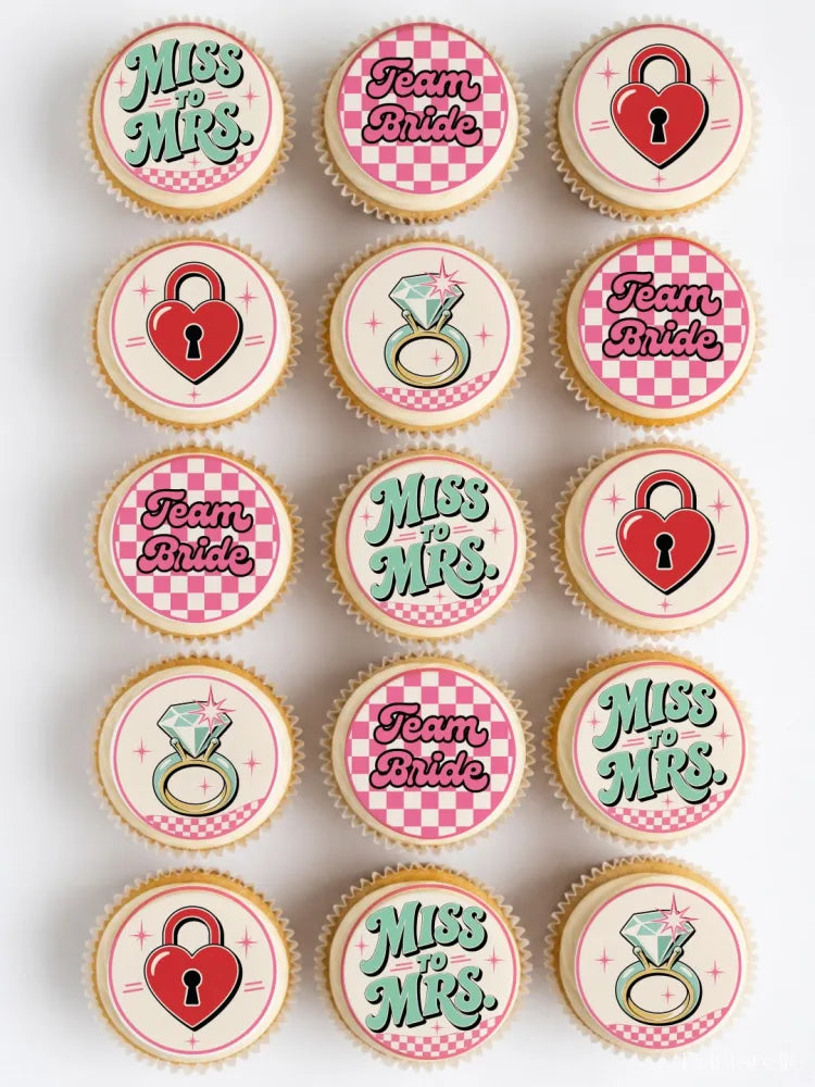 Pink and white checkered cupcakes with miss to mrs and team bride cupcake toppers on icing sheet and wafer paper