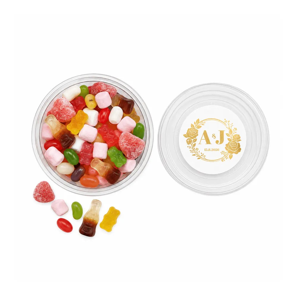 Clear plastic sweet tub with gold embossed monogram wreath foiled sticker lid filled with colorful gummy candies