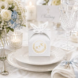 White paper favour box with gold embossed monogram and butterfly lid perfect for wedding favours and monogram wreath designs