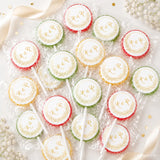 Colorful wrapped fruit lollipops with white gold embossed monogram wreaths perfect for wedding favours