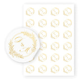 White circular wedding sticker with gold real foil monogram d and m in an ornate monogram wreath design