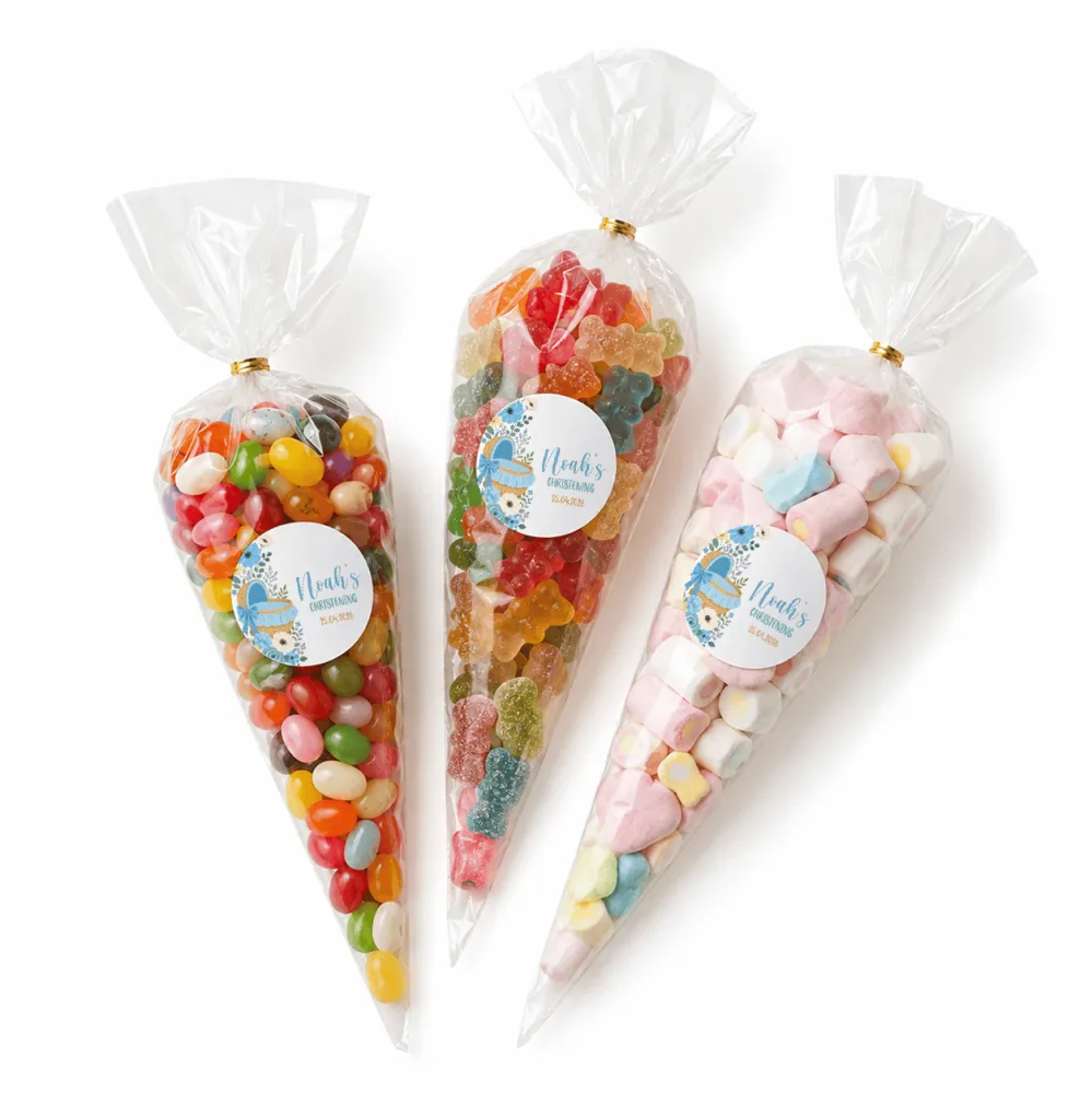 Three clear plastic sweet cones sealed with gold bands and blue moses basket labels for noahs first birthday