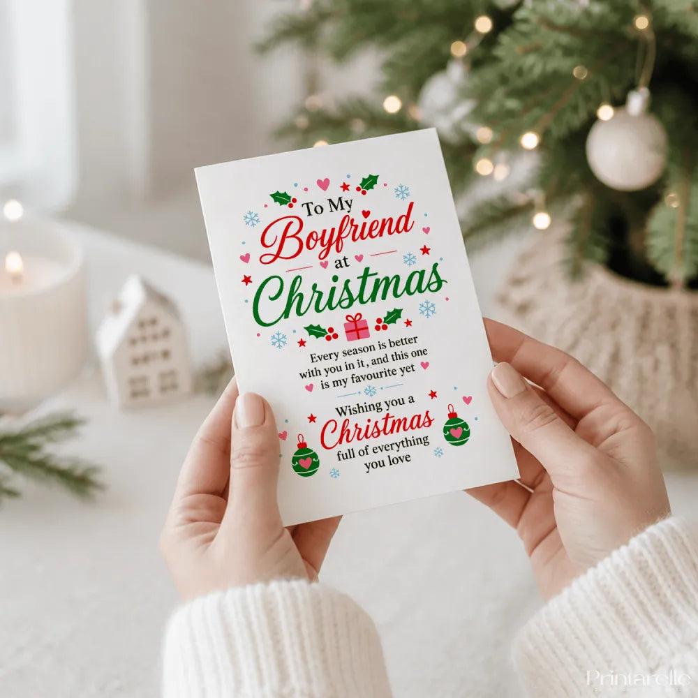 A white boyfriend christmas card with red and green festive illustrations and elegant to my boyfriend at christmas script