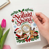 A festive white nollaig shona scratch reveal card with irish language santa elves and reindeer in red and green attire