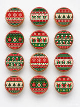 Nordic knit cupcake toppers with red green cream icing sheet designs featuring snowflakes candy canes and trees