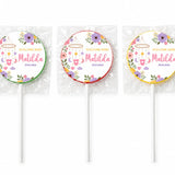 Three swirl lollipops with colorful floral design and welcome baby matilda label for nursery mobile lollipop favours