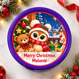Purple circular teddy tub sticker with festive scene featuring woolly owl in red hat and soft toys gift label