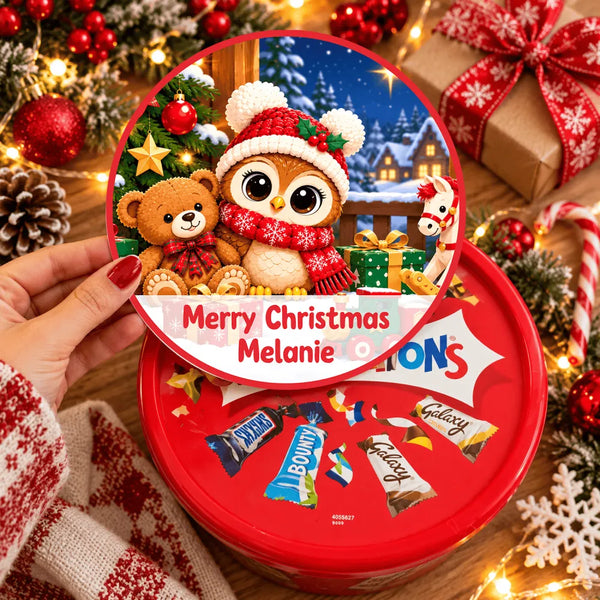 Red circular christmas teddy tub sticker featuring a woolly owl and bear with chocolates like snickers and bounty