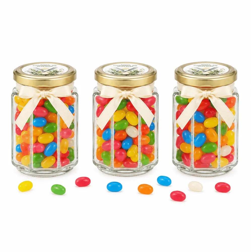 Three clear glass jars with 48mm pale gold lids and cream ribbons filled with colorful jelly beans for peaceful dove confirmation favors