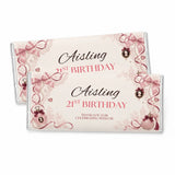 Pink and cream-themed personalised 40g chocolate bar favour wrapped in foil with lace bows perfume bottles and cameo details