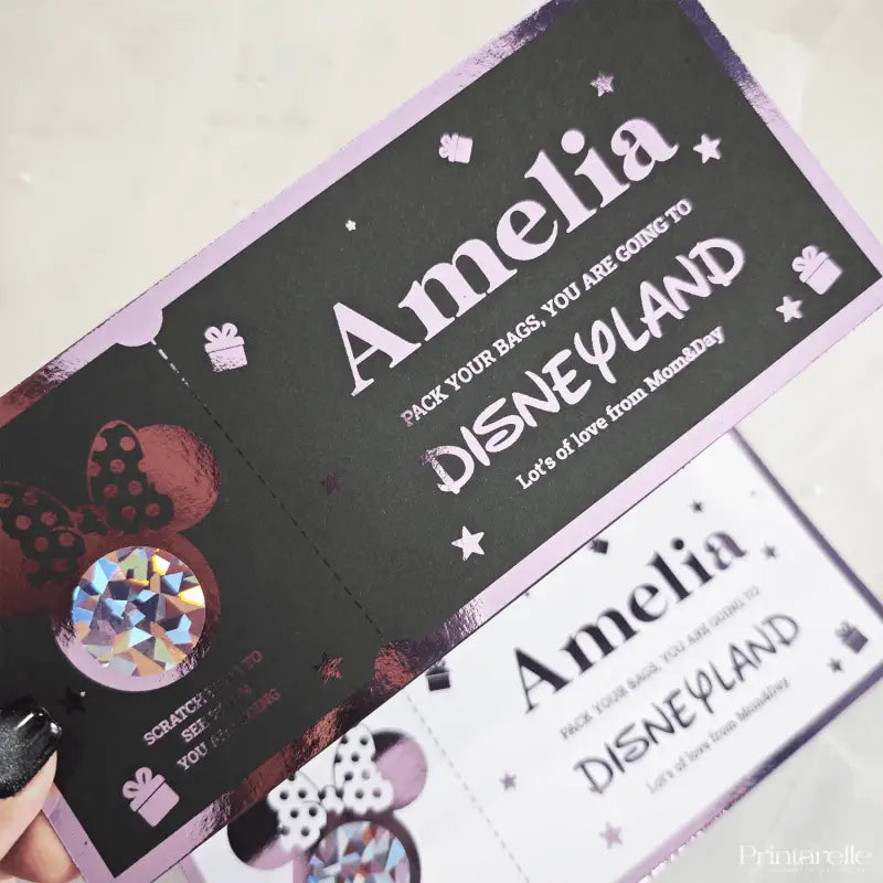 Personalized Disneyland ticket with 'Amelia' on a black and purple background