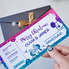 Faux ticket with Disney characters held by a hand, featuring a Christmas theme.