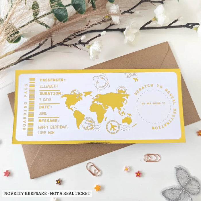 Personalised paris scratch to reveal boarding pass surprise with yellow white design gold foil and world map detail