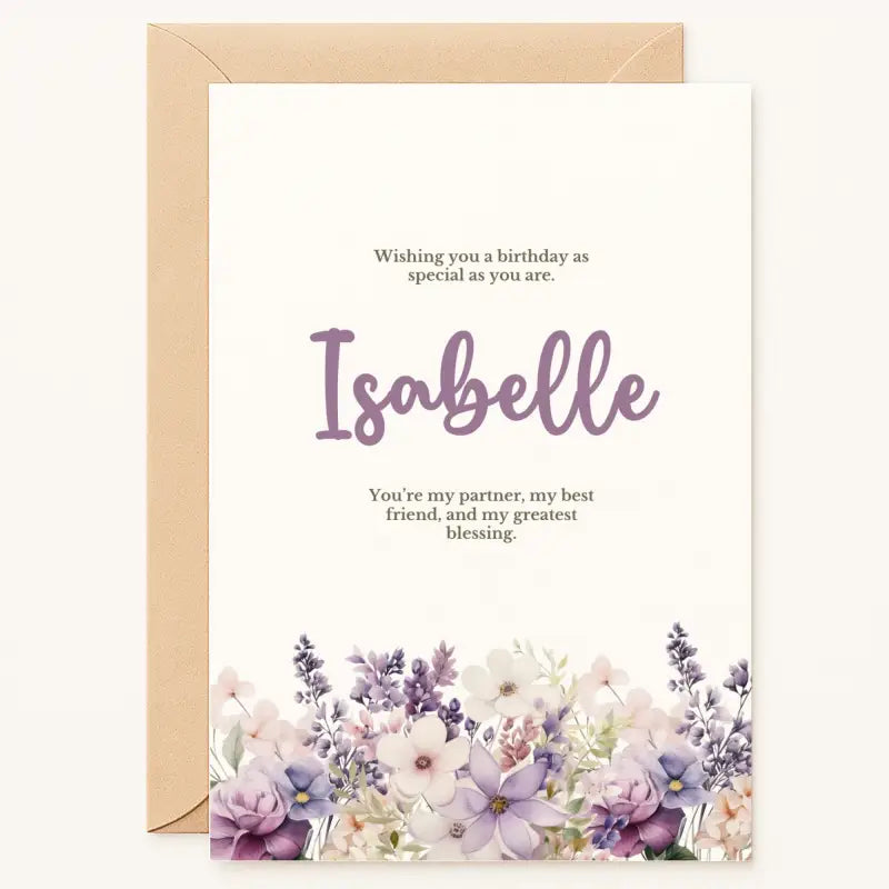 Celebrate your loved one’s birthday with a card as unique as they are. This premium greeting card showcases a delicate bouquet of watercolor flowers in gentle lavender, blush, and cream tones, elegantly framing your chosen name in a modern script font. The front reads: