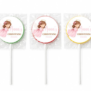 Three personalised pink angel christening lollipops wrapped in cellophane with anna’s christening labels