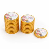Golden chocolate coins with floral and baby shower labels for pink bassinet personalised chocolate coins