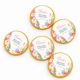 Pink church communion chocolate coins wrapped in pink and gold foil featuring church and candle designs