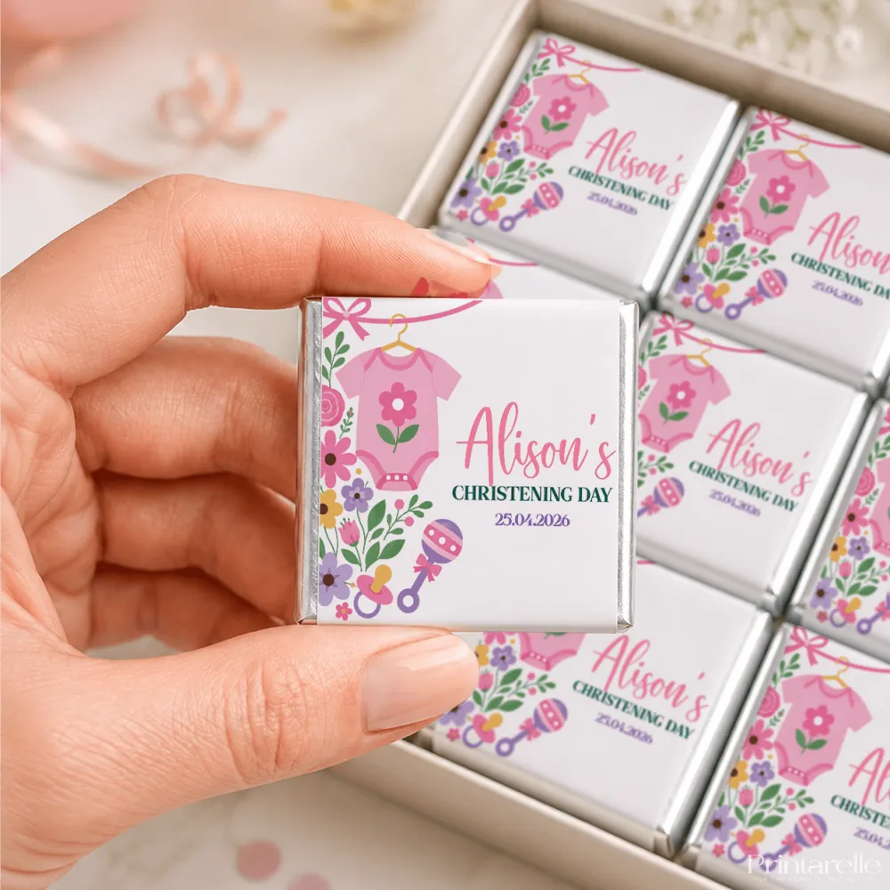 Pink floral themed mini neapolitan chocolates with personalized alisons christening day label and pink babygrow design