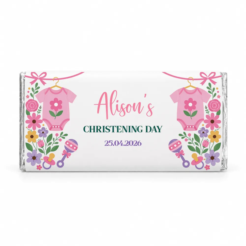 A personalized 40g chocolate bar wrapped in clear foil with pink babygrow design for alisons christening day