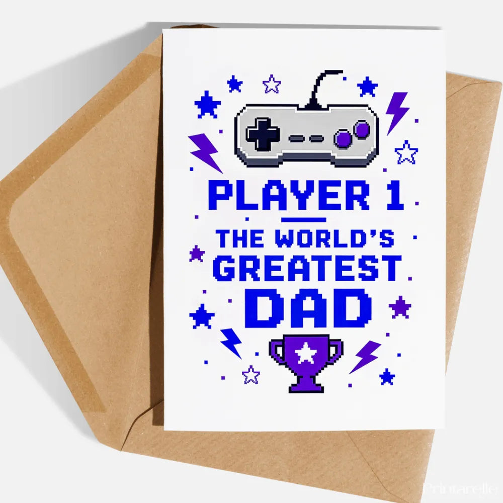 White greeting card with pixel art gray and purple game controller and blue text saying player 1 greatest dad for father’s day retro gaming