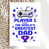 Pixel-art print card with gray purple retro game controller and bold blue text player 1 the worlds greatest dad perfect for father’s day and retro gaming fans