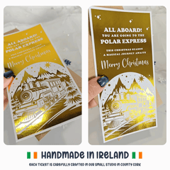 Two Christmas-themed tickets with gold and white designs, held by hands against a light background.
