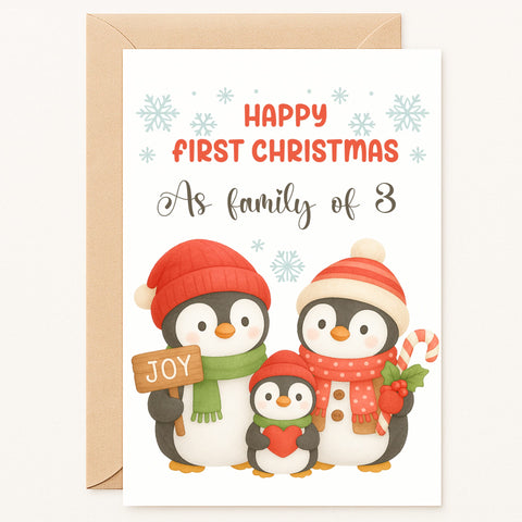 Christmas card with penguins and text 'Happy First Christmas as family of 3'
